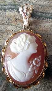 Marked on loop 10K Gold Pendant. Circa 1930 Classic woman portrait Hand carved shell