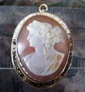 Nicely executed Roman profile Carnelian shell circa 1890th Solid marked 10K yellow Gold Pendant/Brooch