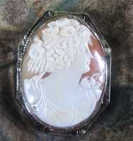 Flora--Roman Goddess of Flowers, Springtime, and Sex Carnelian Shell Circa 1925 14K White Gold Brooch, masterly crafted.