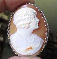 Art Deco Museum Quality Carnelian shell short hair lady’s Portrait Signed by the Artist & marked 14K White Gold circa 1925 Brooch