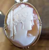 Masterly carved Carnelian shell Greek style hairdress woman Marked 10K Yellow Gold Brooch/Pendant circa 1910