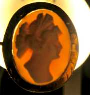 Petite Carved Coral stone from 1910th in the Marked 10K Yellow Gold brooch