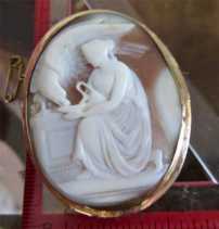 Classic Sardonyx shell in marked 9K Yellow Gold brooch w/safety chain. Greek Mythology Goddess Hebe feeding Eagle. Circa 1890
