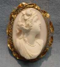 Superiorly carved deep relief coral stone woman’s portrait 10K Yellow Gold filigree Pendant circa 1910