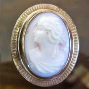 Petite high relief carved Coral stone from 1905-1910 Marked 10K Yellow Gold etched brooch