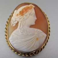 Victorian (circa 1885) marked 10K Yellow Gold cameo. Great quality carved 3 colors shell brooch/pendant