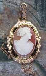 Realistically carved portrait of pretty young woman circa 1910 Marked 10K Yellow Gold Pendant & marked 10K Rose Gold chain