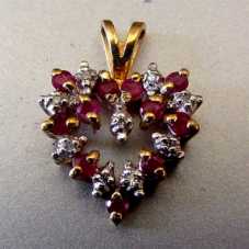 Remarkable Hart Shaped marked 10K Yellow Gold Pendant with Ruby & Diamonds