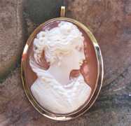 Lady in spanish dress high relief carved carnelian shell Marked 14K Yellow Gold brooch/pendant