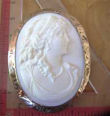 Big carved Coral stone Roman style classic woman’s head Marked 1OK Yellow Gold pendant/brooch circa 1910