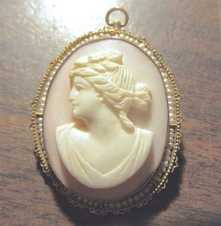 Masterly carved circa 1905 Antique rose and white Coral stone in the 10K Yellow Gold bezel set with seed pearls Pendant/Brooch