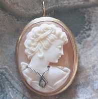 1940-1950 carved Carnelian shell with small Diamond Marked 10K Yellow Gold clasp brooch/pendant