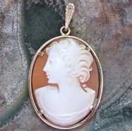 Young Beauty - well carved carnelian shell Marked 14K Yellow Gold pendant