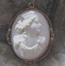 Hand carved Coral stone classic Psyche Goddess of Soul circa 1910 Marked filigree 1OK Yellow Gold pendant/brooch