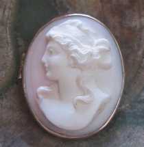 Well carved Coral stone circa 1910 cameo. 10K Yellow Gold etched Brooch