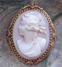 Victorian Antique carved Coral image of Hunting Goddess Diana Hallmarked 10K filigree Yellow Gold pendant Circa 1890