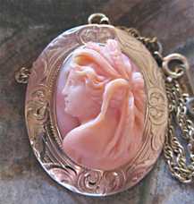 Quality carved high relief red Coral stone of fertility goddess Ceres 10K Marked Yellow Gold circa 1910th Pendant/Brooch with chain