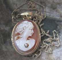 Amazingly carved shell - young girl portrait with a little diamond The 1920th Pendant with the marked 10K Yellow Gold 18’ chain