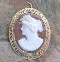 Circa 1890 Goddess Ceres profile - hand carved Carnelian shell. In the marked 10K Yellow Gold well etched Brooch/Pendant.