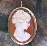 Superiorly hand carved Carnelian shell in the marked 14K Yellow Gold Brooch/Pendant.