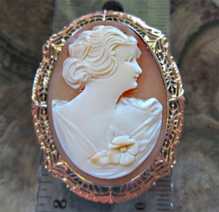 Big well carved shell portrait of woman from 1930th Marked 10K Yellow Gold filigree brooch/pendant.