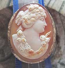 From the 1910th carved Quality Art Nouveau Classic - Goddess Flora Marked 10K Yellow Gold Brooch/Pendant. Signed by the Artist