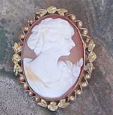 1910th - 1920th woman profile carved shell cameo Marked filigree 10K Yellow Gold brooch