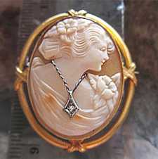Quality carved shell profile portrait with diamond circa 1935 Art Deco marked 10K Yellow Gold Brooch.
