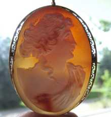 Signed by the Artist well carved 3 colors Classic Big portrait shell Marked 10K Yellow Gold filigree pendant/brooch, 1890-1910