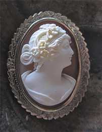 Museum Quality high relief profile carved shell from the 1920th Unmarked/tested 14K solid etched White Gold brooch.