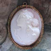 Carving high relief Coral stone huge Cameo depict Diana goddess Marked 10K Yellow Gold Brooch. Great Victorian circa 1890-1905