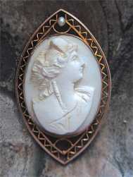 Victorian/Edwardian Hand Carved Angel Skin cameo Circa 1890-1910 10K Gold filigree pendant with the pearl.
