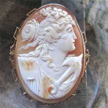 Superiorly carved Edwardian shell depict Polaris - symbol of Hope Huge marked 10K filigree Yellow Gold Brooch. Circa 1910