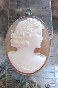 Well hand Carved light Sardonyx shell signed by Artist cameo Circa 1920-1940 tested 10K Gold pendant/brooch.