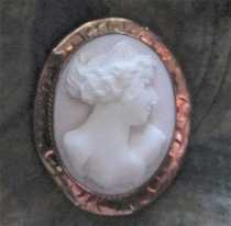 High relief carved Coral stone or Angel skin sexy from 1905-1910 Marked 10K Yellow Gold etched brooch