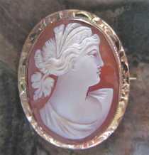Very well carved carnelian shell circa 1920 image of Goddess Ceres Marked 10K Yellow Gold etched Brooch. Signed by the Artist