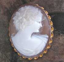 Very well carved shell circa 1950 -1960 image of young Beauty Marked 10K Yellow Gold “twisted rope” Brooch.