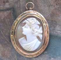 Art Deco carved Edwardian shell from 1910 stylish image Marked 10K Yellow Gold Pendant/Brooch.