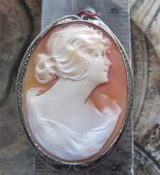 Great Art Deco Museum Quality profile carved in the 1920th Big marked 14K White Gold brooch/pendant.