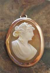 Greatly carved shell - Sea nymphs Nereids with a Star in her hair Edwardian (circa 1910) marked 1OK Yellow Gold Brooch/Pendant