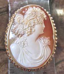 Great Museum Quality Art Deco carved Bacchante from the 1920th Big marked 14K Yellow Gold twisted rope brooch/pendant.
