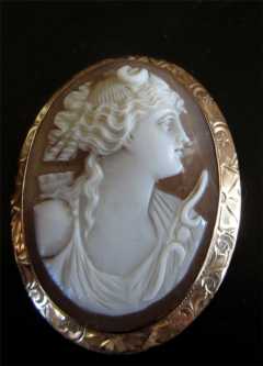 Perfectly carved 10K Yellow Gold Circa 1890. Greek Goddess Diana with her symbols.