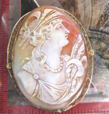 Art Deco Museum Quality carved Ceres Goddess circa 1910th Big marked 10K Yellow Gold filigree bezel brooch.