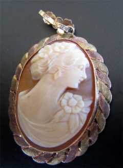 Hand carved Young Lady Carnelian Shell Cameo 3 Color 10K Marked Gold Bezel Circa 1930.