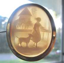 Victorian pastoral scene of girl and goat at the village landscape Unmarked/tested by shop 14K Yellow Gold brooch circa 1885