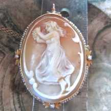 Dancing Bacchante with grapes carved Museum shell circa 1895. Signed Marked 10K Yellow Gold decorative w/pearls brooch/pendant & chain.