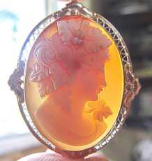 Museum finely carved Bacchante image multi colored shell. Marked 14K Yellow Gold brooch/pendant. Circa 1940