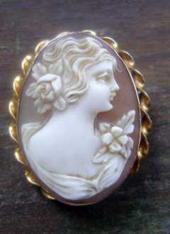 Hand carved Young Lady Sardonyx Deep Relief Shell Cameo 10K Marked Gold Bezel Circa 1920.