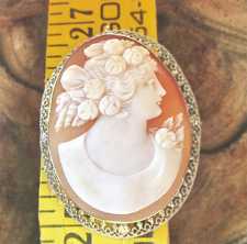 Circa 1930 greatly executed shell - portrait of girl with a flowers Marked (partially faded) 10K White Gold filigree Brooch/Pendant.