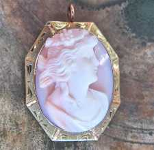 High relief Angel Skin Great carving depict Bacchante Marked 10K Yellow Gold Brooch/Pendant Circa 1915.